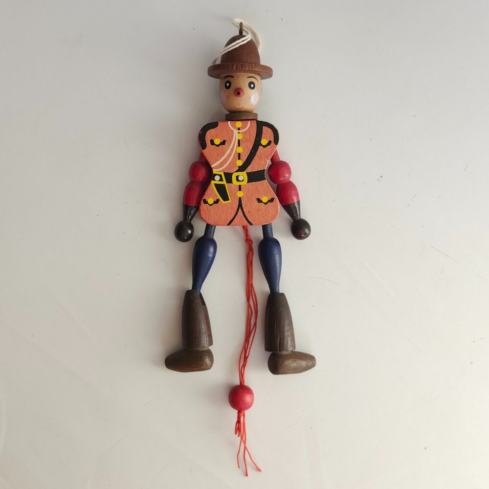 Vintage Wooden Canadian Mountie Pull String Puppet Christmas Ornament 8in High